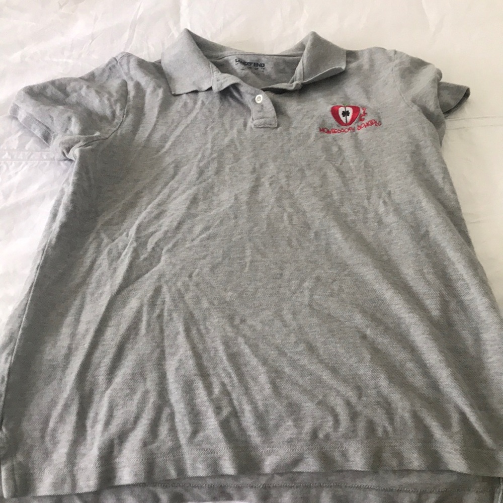 Apple Montessori work shirt (3 months wear)